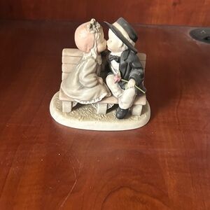 Charming Figurine of a Kissing Couple